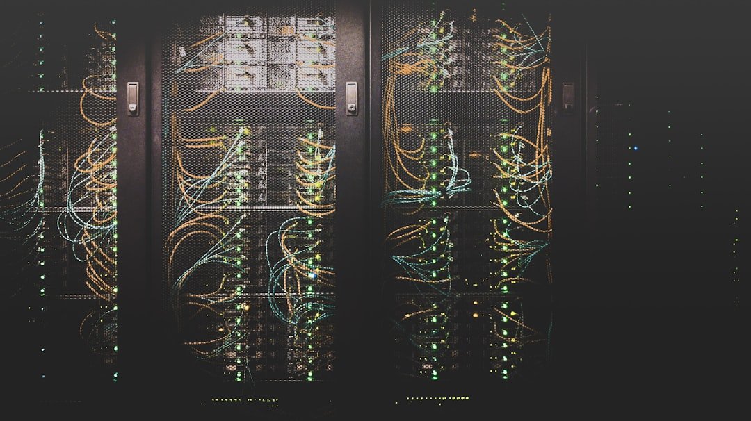 Rows of illuminated servers in a modern data centre